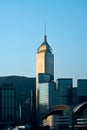 Skyline of skyscrapers at Wan Chai district at dawn, with the Hong Kong Convention & Exhibition Centre in the foreground Royalty Free Stock Photo