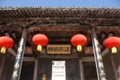 Hongcun Ancient Town in Anhui Province, China. Close up of signs and red lanterns at Lexu Hall