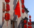 Hongcun Ancient Town in Anhui Province, China. Traditional building with red lanterns and Chinese flag Royalty Free Stock Photo