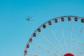 Detail of the Hong Kong observation wheel and Helicopter on blue sky