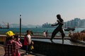 People at Bruce Lee statue at Tsim Sha Tsui Promenade Avenue of the Stars in Hong Kong Royalty Free Stock Photo