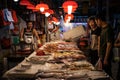 HongKong, China - November, 2019: People buying fish on food market in HongKong, China