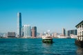Star Ferry boat on Central Star Ferry Pier  and Kowloon skyline background, Hong Kong Royalty Free Stock Photo