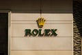 The Rolex logo signage on shop facade in Hongkong