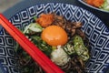 Hongkong style noodle with fresh raw egg and some vegetables. Royalty Free Stock Photo