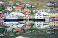 Honningsvag Harbour - colored houses and boats reflected in the water Royalty Free Stock Photo