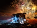 Guns N' Roses play music on stage as fireworks explode and crowd cheers Royalty Free Stock Photo