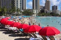 Reality of overcrowded resort beaches in popular Waikiki Beach. Travel and hospitality in tropical Hawaiian island Oahu.