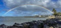 Honolulu, Hawaii - Nov 6, 2021-Rainbow over beach on Oahu, Hawaii Royalty Free Stock Photo