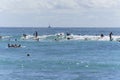 Honolulu, Hawaii - Nov 6, 2021-Young boys play on their boogey boards in the surf Royalty Free Stock Photo