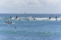 Honolulu, Hawaii - Nov 6, 2021-Young boys play on their boogey boards in the surf Royalty Free Stock Photo