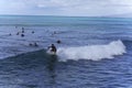 Honolulu, Hawaii - Nov 6, 2021-Young boys play on their boogey boards in the surf Royalty Free Stock Photo