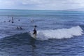 Honolulu, Hawaii - Nov 6, 2021-Young boys play on their boogey boards in the surf Royalty Free Stock Photo