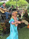 Honolulu, Hawaii - 5/2/2018 - Senior Hawaiian woman performing traditional hula dance