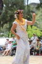 Honolulu, Hawaii - 5/2/2018 - Senior Hawaiian woman performing traditional hula dance