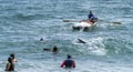 Honolulu, Hawaii, USA - 2022-08-20 - Shaka Filming Hukilau - a small boat hauls the fishing net out to the ocean while