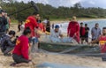 Honolulu, Hawaii, USA - 2022-08-20 - Shaka Filming Hukilau - A videographer films people preparing the net for the ocean Royalty Free Stock Photo