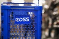 Ross Stores corporate logo on blue store shopping cart with selective focus