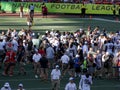 Players gather on field for interviews after game