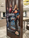 Marvel Avengers Happy Meal Toy Figure display featuring Iron Man, Thor, Captain Marvel, Black Widow, and Captain America