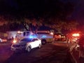 Honolulu Police Department police car and Fire Trucks lights flash on College Campus at night Royalty Free Stock Photo