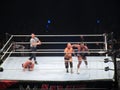 WWE Wrestler Big E of the New Day whips Scott Dawson of the Revival in ring during tag team match at WWE event