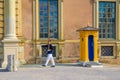 Honor guard soldier is on duty and booth post near central entrance of Swedish Royal Palace Royalty Free Stock Photo