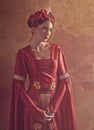 Honor and pride. Female portrait with medieval dress and crown Royalty Free Stock Photo