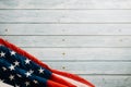 In honor of Veterans Day, American flags against a wooden backdrop Royalty Free Stock Photo