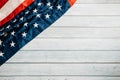 In honor of Veterans Day, American flags against a wooden backdrop Royalty Free Stock Photo