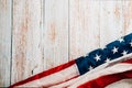 In honor of Veterans Day, American flags against a wooden backdrop Royalty Free Stock Photo