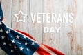 In honor of Veterans Day, American flags against a wooden backdrop Royalty Free Stock Photo