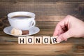 Honor. Wooden letters on the office desk, informative and communication background Royalty Free Stock Photo