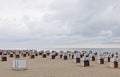 Hooded beach chairs (strandkorb) at the Baltic seacoast Royalty Free Stock Photo