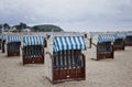 Hooded beach chairs (strandkorb) at the Baltic seacoast Royalty Free Stock Photo