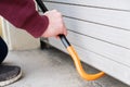 Hooded burglar forcing window shutter lock