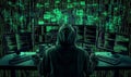 Hooded figure hacking multiple computers in a dark room filled with code screens Royalty Free Stock Photo