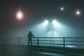 A hooded figure, standing with back to camera on a bridge, looking at UFO alien spaceships coming down from the sky Street lights.