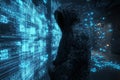 A hooded figure stands before a wall of glowing blue digital code, representing a hacker Royalty Free Stock Photo
