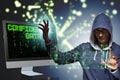 The hooded hacker in data computer security concept Royalty Free Stock Photo