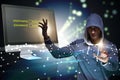 The hooded hacker in data computer security concept Royalty Free Stock Photo
