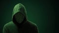 Hooded Hacker on Digital Background: Cybersecurity Concept