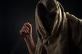 Hooded man with  big knife Royalty Free Stock Photo