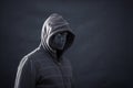 Hooded man with black mask Royalty Free Stock Photo