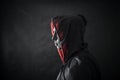 Hooded man in the dark Royalty Free Stock Photo