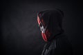 Hooded man in the dark Royalty Free Stock Photo