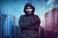 Hooded man wearing guy fawkes mask Royalty Free Stock Photo