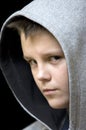 Hooded teenage boy