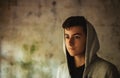 Hooded teenage boy in an abandoned house Royalty Free Stock Photo