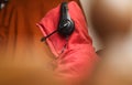 Hooded unidentifiable man with headphones Royalty Free Stock Photo